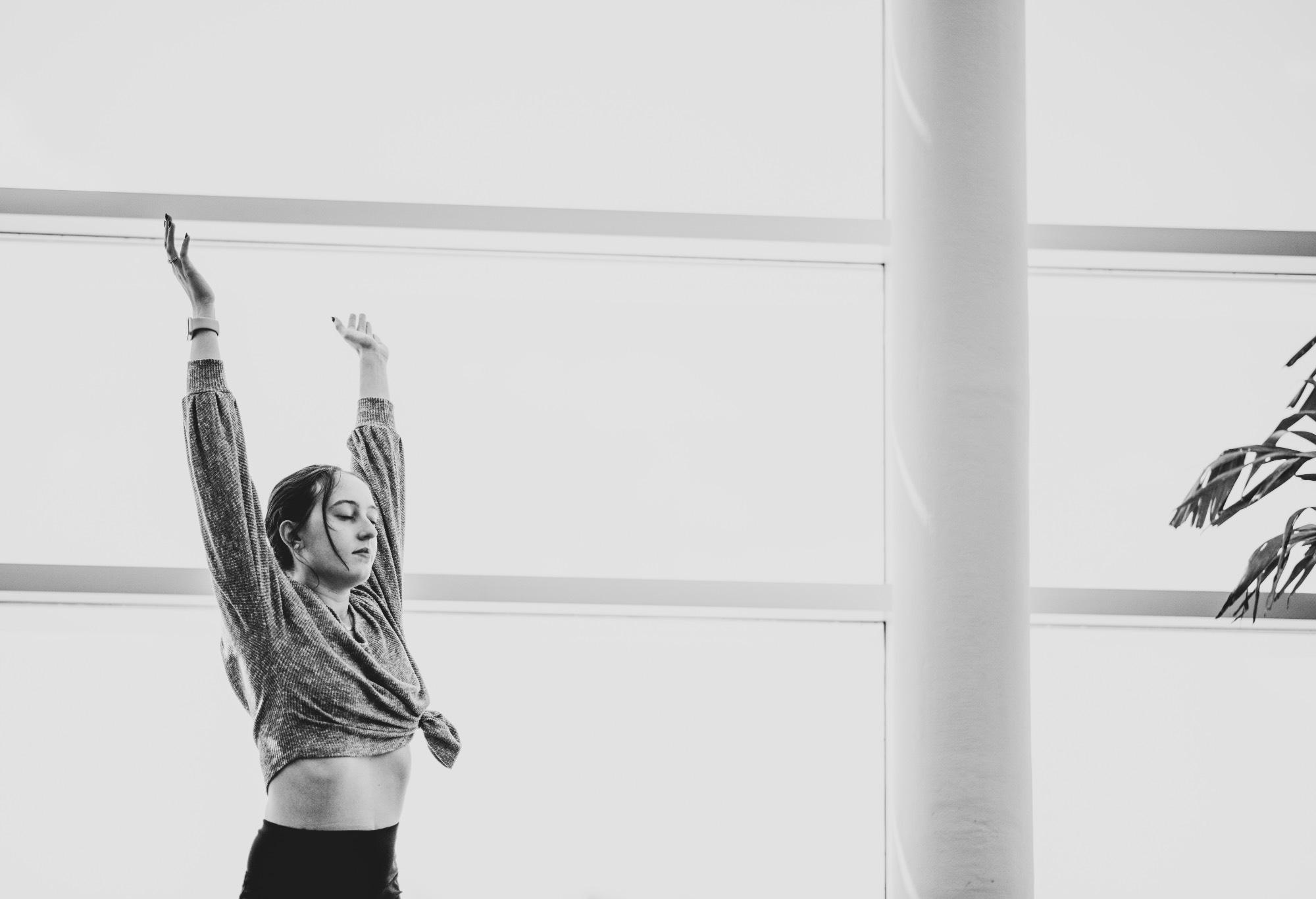 student practicing yoga